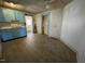 The classic kitchen features vintage appliances, tiled flooring, and easy access to other rooms at 2711 Ashe St, Durham, NC 27703