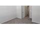 Bedroom featuring plush carpeting, neutral walls and an open door to another room at 280 Chesapeake Commons St # 151, Garner, NC 27529