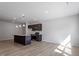 Spacious kitchen with stainless steel appliances and a central island with granite countertops at 280 Chesapeake Commons St # 151, Garner, NC 27529