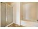 Bathroom featuring a shower and a soaking tub at 314 Mason Trace, Burlington, NC 27217