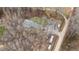 Aerial view of a home on a large lot with mature trees at 3405 Wilsons Mills Rd, Smithfield, NC 27577
