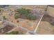 Aerial view of land featuring a home, horse pastures, and a road at 3405 Wilsons Mills Rd, Smithfield, NC 27577