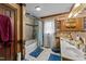 Traditional bathroom with warm brown walls, single sink, and a shower/tub combo at 3405 Wilsons Mills Rd, Smithfield, NC 27577