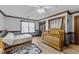Bedroom with wood-look floors, a small bed, and a wooden crib at 3405 Wilsons Mills Rd, Smithfield, NC 27577