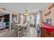 Bright dining room with many windows and neutral colored decor at 3405 Wilsons Mills Rd, Smithfield, NC 27577