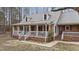 Charming home with dormer windows and a welcoming front porch at 3405 Wilsons Mills Rd, Smithfield, NC 27577