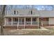 Charming home featuring a large front porch, dormer windows, and well-maintained landscaping at 3405 Wilsons Mills Rd, Smithfield, NC 27577