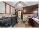 Laundry room with modern washer and dryer set and wood flooring at 3405 Wilsons Mills Rd, Smithfield, NC 27577
