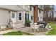 Back patio with a dining table set, gas grill, and access to the home's exterior at 3405 Wilsons Mills Rd, Smithfield, NC 27577