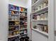 Well-stocked pantry with ample shelving, providing organized storage for food and household items at 38 Kingbird Ln, Chapel Hill, NC 27517