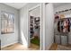 Spacious walk-in closet with custom shelving, hanging racks, and ample storage for organization at 38 Kingbird Ln, Chapel Hill, NC 27517