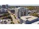 Condominium aerial view with a backdrop of urban buildings and tree-lined streets at 400 W North St # 804, Raleigh, NC 27603