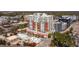 Stunning aerial view of a high-rise condominium with brick accents and the surrounding cityscape at 400 W North St # 804, Raleigh, NC 27603