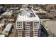 Birds-eye view showcases the building's modern design and rooftop features at 400 W North St # 804, Raleigh, NC 27603