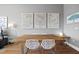 Dining room featuring a wooden table, modern chairs, and Raleigh city maps at 400 W North St # 804, Raleigh, NC 27603