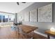 Open concept living area showcasing dining room with hardwood floors and city views at 400 W North St # 804, Raleigh, NC 27603