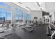 Well-equipped gym with natural light and city views at 400 W North St # 804, Raleigh, NC 27603
