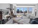 Spacious living room filled with natural light, showcasing city views through large windows at 400 W North St # 804, Raleigh, NC 27603