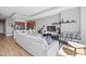 Spacious living room with modern decor, hardwood floors, and an open layout to the kitchen at 400 W North St # 804, Raleigh, NC 27603