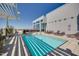 Rooftop pool with lounge chairs and city views at 400 W North St # 804, Raleigh, NC 27603
