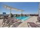 Rooftop pool with lounge chairs and city views at 400 W North St # 804, Raleigh, NC 27603