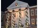 Well-lit Cary Arts Center adorned with festive decorations for a holiday celebration at 431 S Harrison Ave, Cary, NC 27511