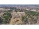 Stunning aerial view of a gorgeous home surrounded by lush landscaping at 4420 Bunton Swaim Rd, Liberty, NC 27298