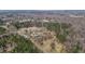 Aerial shot of a home with large property and mature trees at 4420 Bunton Swaim Rd, Liberty, NC 27298