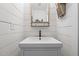 Charming powder room with shiplap walls and designer faucet, beautifully decorated at 4420 Bunton Swaim Rd, Liberty, NC 27298