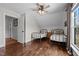 Bedroom with hardwood floors, vaulted ceiling, and two twin beds perfect for or guests at 4420 Bunton Swaim Rd, Liberty, NC 27298