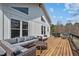Relaxing outdoor deck features comfortable seating and a grill, perfect for entertaining guests at 4420 Bunton Swaim Rd, Liberty, NC 27298