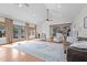 Open-concept living room with vaulted ceiling and hardwood floors, ideal for entertaining at 4420 Bunton Swaim Rd, Liberty, NC 27298