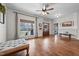 Open living room with hardwood floors, natural light, and a view of the front yard at 4420 Bunton Swaim Rd, Liberty, NC 27298