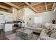 Bright living room with open floor plan showcases a large sectional and modern decor at 500 N Duke St # 53104, Durham, NC 27701