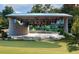 Outdoor amphitheater offering community venue for concerts and gatherings with lawn seating at 600 Hedrick Ridge Road # 312, Cary, NC 27519