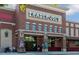 Brick facade of a Trader Joe's store with prominent signage, arched windows, and inviting entrance at 600 Hedrick Ridge Road # 312, Cary, NC 27519