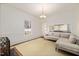 Bright living room featuring a cozy sectional sofa and an open view to the kitchen at 603 Polk St, Raleigh, NC 27604
