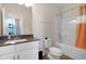 Bathroom featuring modern vanity, toilet, and tub with shower in a well-lit space at 624 Red Arrow Dr, Knightdale, NC 27545
