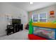 Playful bedroom with bounce house and television, perfect for a space at 624 Red Arrow Dr, Knightdale, NC 27545