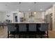 Stylish kitchen with pendant lighting, stainless steel appliances, and a large center island with seating at 624 Red Arrow Dr, Knightdale, NC 27545