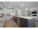 Spacious kitchen with a large island, stainless steel appliances, and an open layout at 624 Red Arrow Dr, Knightdale, NC 27545