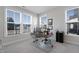 A bright and spacious home office features a large window, neutral walls, and a modern desk at 624 Red Arrow Dr, Knightdale, NC 27545