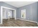 Inviting living room featuring fresh paint, attractive floors, and bright windows, offering comfort at 636 Tucker St, Burlington, NC 27215