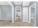 Bright living room with fresh paint, attractive floors, and an open feel thanks to doorways at 636 Tucker St, Burlington, NC 27215