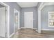 Bright living room with fresh paint, attractive floors, and an open feel thanks to doorways at 636 Tucker St, Burlington, NC 27215