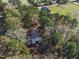 Aerial view of outbuilding surrounded by lush greenery on the property at 6404 Pulley Town Rd, Wake Forest, NC 27587
