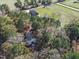 Aerial view of large outbuilding surrounded by trees and foliage on the property at 6404 Pulley Town Rd, Wake Forest, NC 27587