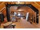 Unfinished attic space with exposed rafters, showing potential for customization and storage at 6404 Pulley Town Rd, Wake Forest, NC 27587