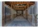 Stables featuring wooden horse stalls with access to a drive through for equipment and animal transport at 6404 Pulley Town Rd, Wake Forest, NC 27587