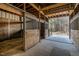 Interior view of a barn featuring several stalls with access to the pasture at 6404 Pulley Town Rd, Wake Forest, NC 27587